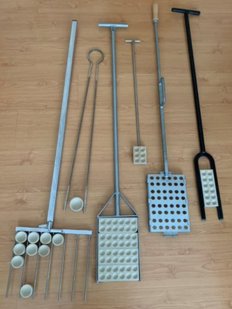 Cupel tongs and cupel loaders